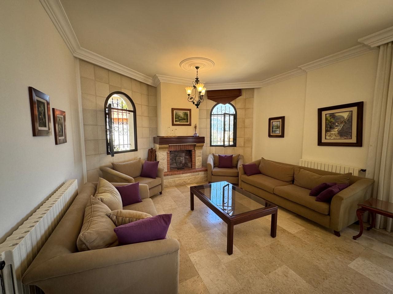 Ref (JZ10.V.43)

Exclusive Villa for Sale – One Minute from St Charbel Monastery

-City: Aanaya 
-Land area : 1000 sqm 
-Built up area: 300 sqm 
-Garden & Terrace: 850 sqm 
-Price: 350,000$ (cash) 
- Bedrooms: 4 ( 1 Master)
- Bathrooms: 2
- Living rooms: 2
- Dining rooms: 1
- Dressing rooms: 1
- Balcony: 5
- Parking spots: 4 (Covered) 
- Maid's room: 1

- Features : 
*Sea View
*Open Mountain View
*St Charbel View 
*One Minute From St Charbel 
*High-end Finishing 
*Close To All Amenities 
*Very Prime Location
*Full Stone Cladding 
*Calm Area
*Double Wall
*Double Glass
*Heating systems 
*Chimney
*Gypsum 
*Lighting
*Used Like New 
*Fully Furnished 
*Fully Decorated 
*Storage room 
*140,000 L Water Tank

Brokerage fees: 2.5 % in case of selling / 1 month rental value in case of rent. 

For more info, kindly contact us on 71 66 55 71 / 71 788 178 or message us on WhatsApp with your full name and the reference number of the property and we will contact you the soonest.

I SOLD is a member of the Real Estate Syndicate of Lebanon (REAL)

I SOLD (Lebanon), Zalka Highway, Zalka 690 Bld. 6th Floor

فيلا مميزة للبيع – على بعد دقيقة واحدة من دير مار شربل
- الموقع: عنايا
- مساحة الأرض: 1000 متر مربع
- مساحة البناء: 300 متر مربع
- الحديقة والتراس: 850 متر مربع
- السعر: 350,000 دولار (نقداً)
- غرف النوم: 4 (منها غرفة رئيسية/ماستر)
- الحمامات: 2
- غرف المعيشة: 2
- غرفة طعام: 1
- غرفة ملابس: 1
- شرفات: 5
- مواقف سيارات: 4 (مغطاة)
- غرفة خادمة: 1

- الميزات:
* إطلالة على البحر
* إطلالة جبلية مفتوحة
* إطلالة على دير مار شربل
* على بعد دقيقة واحدة من دير مار شربل
* تشطيبات فاخرة وعالية الجودة
* قريبة من جميع الخدمات والمرافق
* موقع استراتيجي ومميز جداً
* واجهة مكسوة بالكامل بالحجر الطبيعي
* منطقة هادئة
* جدران مزدوجة (عازلة)
* زجاج مزدوج
* أنظمة تدفئة
* مدفأة (شومينيه)
* ديكورات جبسية
* إضاءة مميزة
* حالة ممتازة (مستعملة كالجديدة)
* مفروشة بالكامل
* مجهزة بالديكورات بالكامل
* غرفة تخزين
* خزان مياه سعة 140,000 لتر

رسوم الوساطه في حاله البيع ٢٫٥ ٪ وقيمة شهر في حالة الإيجار 

للمزيد من المعلومات، يرجى الاتصال بنا على  (71788178)(96171665571+) أو مراسلتنا على الواتساب مع الإسم الكامل والرقم المرجعي للعقار وسنتواصل معك في أقرب وقت

شركة  ( أي سولد )  عضو في نقابه الوسطاء والاستشاريين العقاريين في لبنان	 